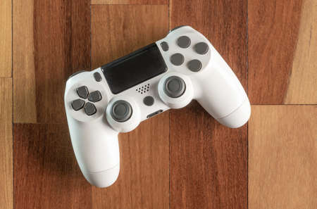 game controller on wooden floor
