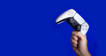 Playstation 5 controller on man hands, 22 Dec, 2020 - Sao Paulo, Brazilのeditorial素材