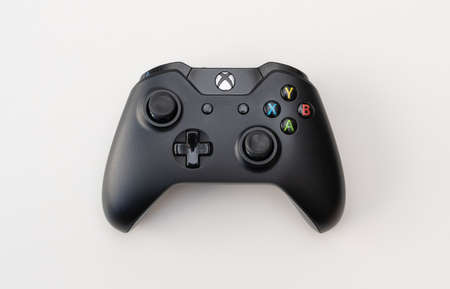 Xbox One game controller on white background
