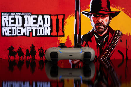 Red Dead Redemption 2 on screen with Playstation 5 controller. 18th Mar, 2021, Sao Paulo, Brazil.のeditorial素材