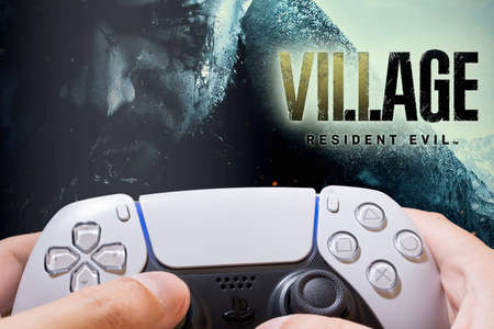 Man play Resident Evil Village demo on Playstation 5, 3 Mar 2021, Sao Paulo, Brazil.