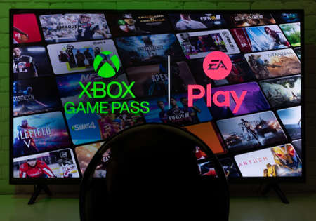 Xbox Game Pass with EA Play on smartv screen. This 2 services are included on Xbox Game Pass Ultimate. 17 May, 2021, Sao Paulo, Brazil.のeditorial素材