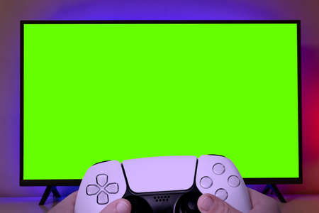 TV with green screen for cropping with game controller