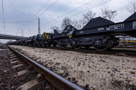 Burgas, Bulgaria - January 24, 2017 - Freight cargo train - 6-axled flat wagon - Sahmmn - WW 604 A- Transvagon ADのeditorial素材