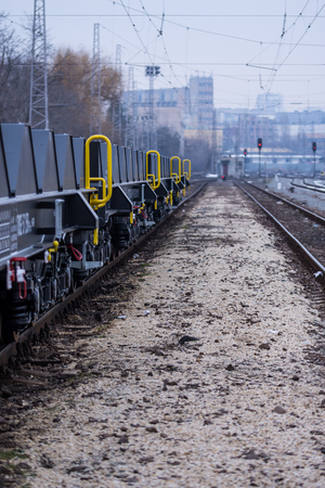 Burgas, Bulgaria - January 24, 2017 - Freight cargo train - 6-axled flat wagon - Sahmmn - WW 604 A- Transvagon ADのeditorial素材
