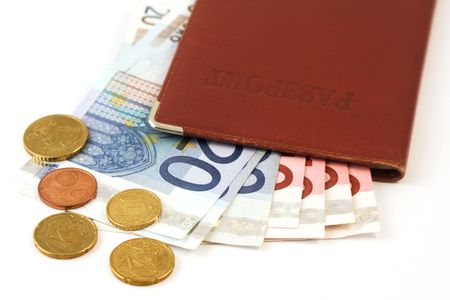 passport with Euro notes over white backgroundの写真素材