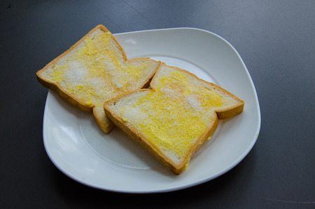 Toast with Butter and Whith Sugarの写真素材