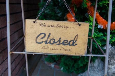 Close-up Retro Wooden Sign "We are Sorry" Closed Please Call me agian Memo to all Customer Remindの写真素材