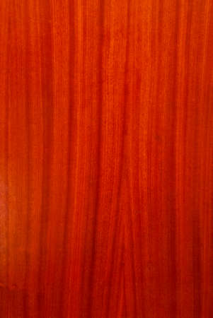 Vertical background of wood varnished in dark color, for desktop, wallpaper, textの写真素材