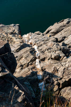 Quartz vein on slate rock next to the Gabriel and Galan reservoir Extremaduraの写真素材