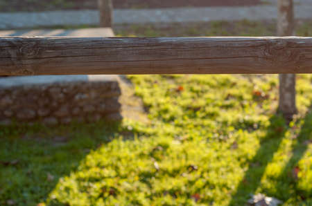 Wooden fence slat in outdoor field brown color in horizontalの写真素材