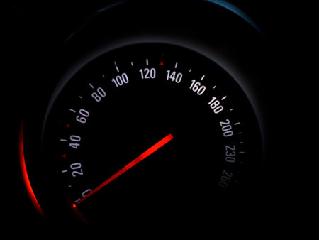 Car speedometer to monitor speed in dark night modeの写真素材