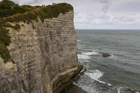 view of the coast, the sea on a day with cloudy sky