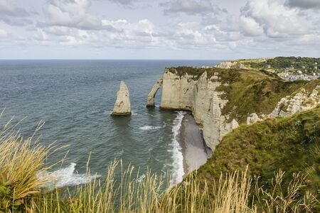 view of the coast, the sea on a day with cloudy sky