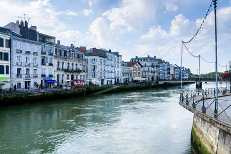 view of the city, the river, the streets and some buildings on a sunny day with cloudsのeditorial素材