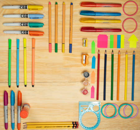 Pencils and utensils for drawing and working at home, with different colors and space to include texts.の写真素材