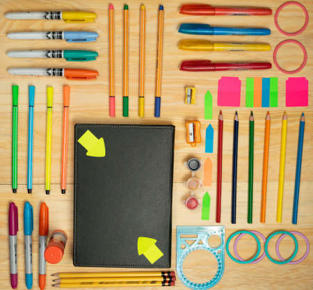 Pencils and utensils for drawing and working at home, with different colors and space to include...