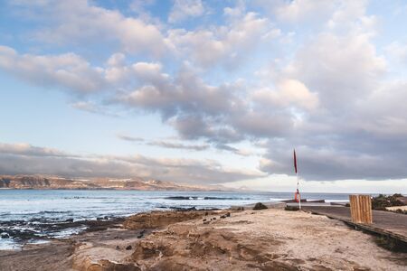 El confital beach at sunrise in Gran Canaria, Canary islands, Spain. Coast volcanic landscape.の写真素材