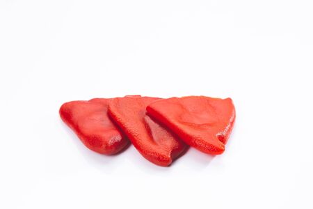 Roasted piquillo peppers isolated on white background. Top view.の写真素材