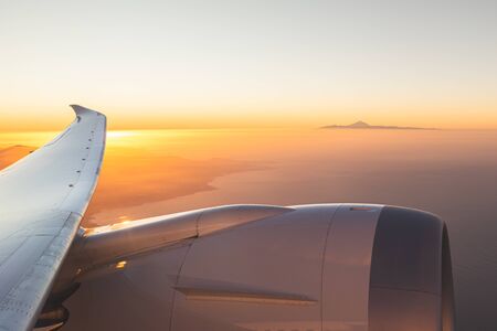 Wonderful aerial views at sunset of El Teide seen from the window of the plane in Gran Canaria....