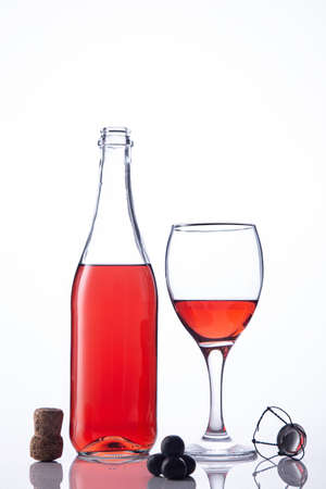Bottle and glass of Lambrusco wine on white background.の写真素材