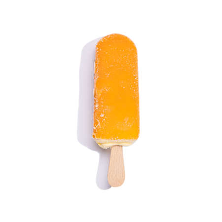 Orange ice cream isolated on white background with copyspace.の写真素材