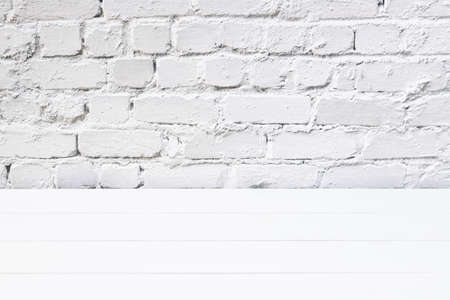 White wood and brick background.