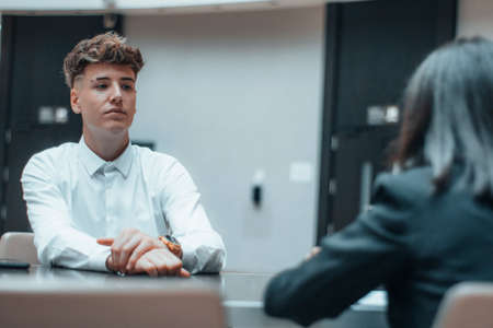 Lawyer works as a team with her client in her office in a sit-down meetingの写真素材