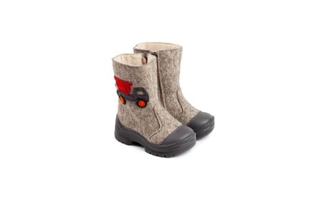children's winter felt boots beige with a drawn car isolated the white backgroundの写真素材