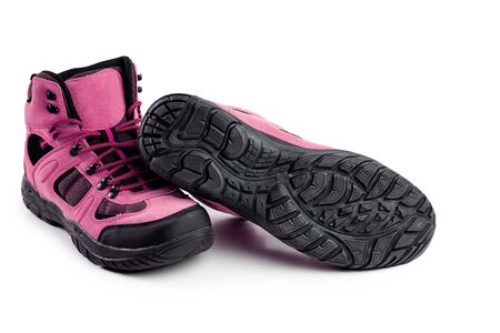 mens winter boots pink for expeditions of travel isolated on a white backgroundの写真素材
