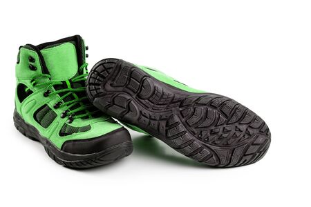 mens winter boots green for expeditions of travel isolated on a white backgroundの写真素材