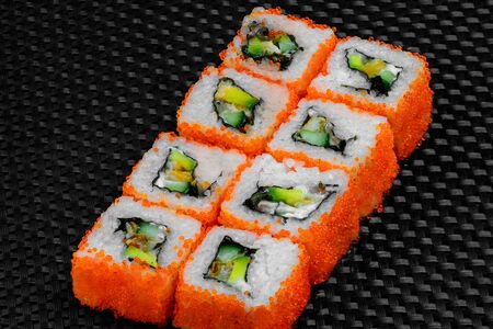 Japanese rolls on a dark textured backgroundの写真素材