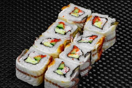 Japanese rolls on a dark textured backgroundの写真素材
