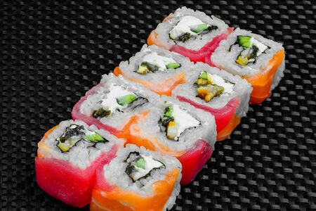 Japanese rolls on a dark textured backgroundの写真素材