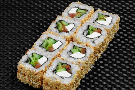 Japanese rolls on a dark textured backgroundの写真素材