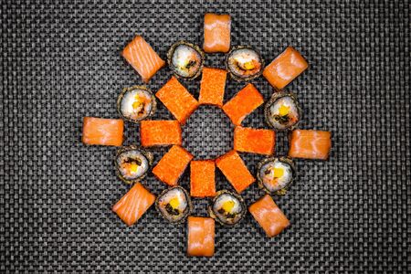 Japanese rolls on a dark textured backgroundの写真素材
