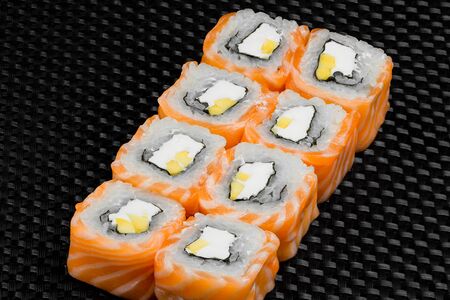 Japanese rolls on a dark textured backgroundの写真素材