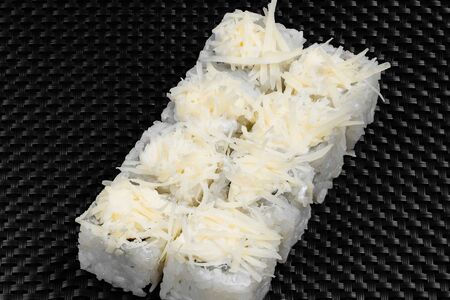 Japanese rolls on a dark textured backgroundの写真素材