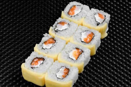Japanese rolls on a dark textured backgroundの写真素材
