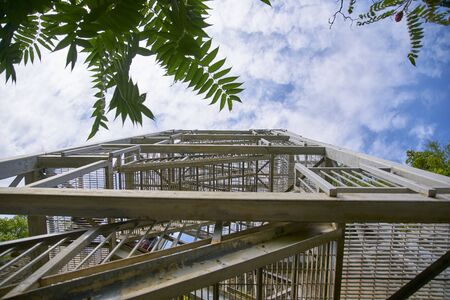 Metal Stair going to the blue skyの写真素材