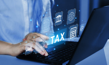 Tax concept on virtual screen. Business, technology and internet concept.の写真素材