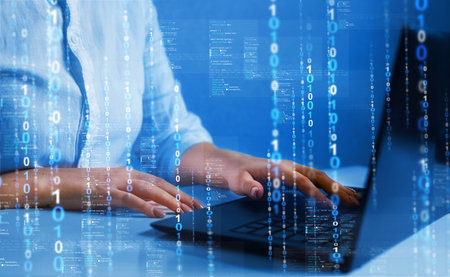 business, technology and internet concept - close up of businesswoman with laptop computer and...