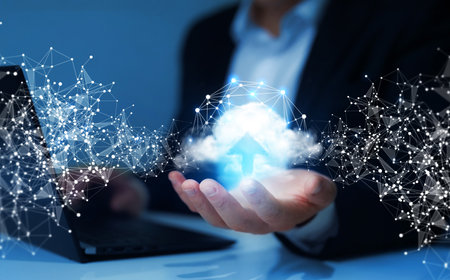 Businessman on blurred background using digital cloud network interface 3D renderingの写真素材