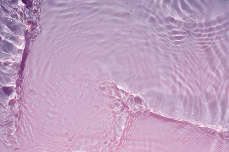 close up of pink water surface texture and background with copy space.の写真素材