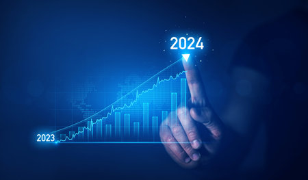 Businessman holding growth graph a year 2024 of business and data analysis. Development to success in year 2024.の写真素材