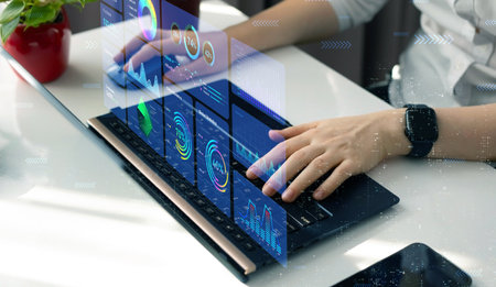 business, technology, internet and networking concept - close up of woman hands working with laptop...