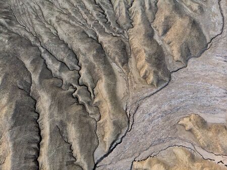 Beautiful aerial view of a lunar landscape  over the muddy volcanoes, Paclele, Berca, Buzau County,...