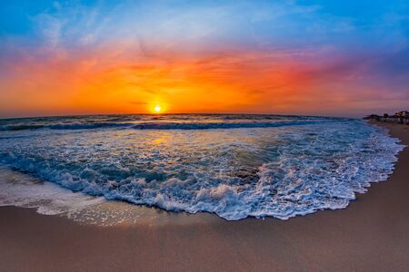 Beautiful view of the sea in the morning sunrise with lace like waves washing the shore, Vama Veche,...