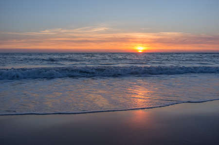 Beautiful and colorful sunset sky over the North Sea, Petten, Hollandの写真素材
