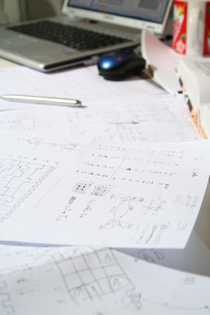 Business office desk with handwritten Papers